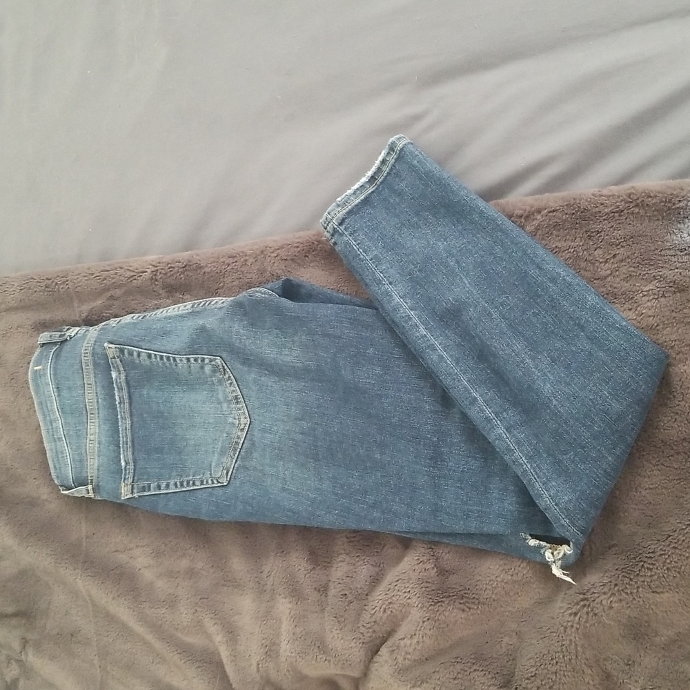 Free People jeans size 27 with holes in knees
